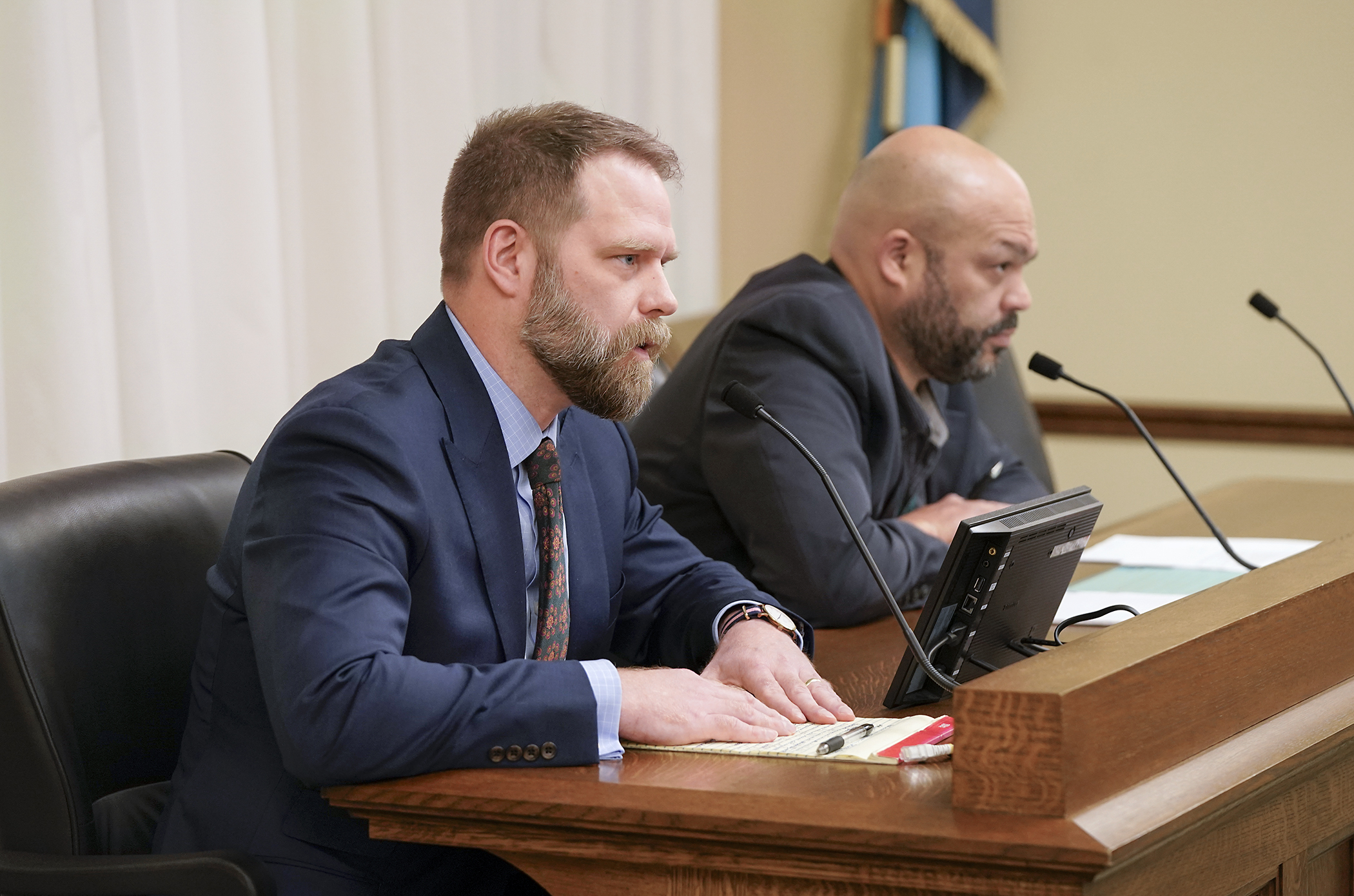 Devin Bruce, director of legislative and political affairs at the Minnesota Association of Professional Employees, testifies March 11 against HF3822, sponsored by Rep. Walter Hudson. (Photo by Michele Jokinen)